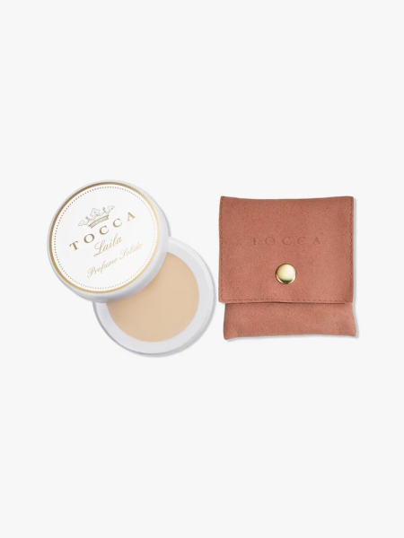 Tocca Laila Solid Perfume in branded components on a light gray background